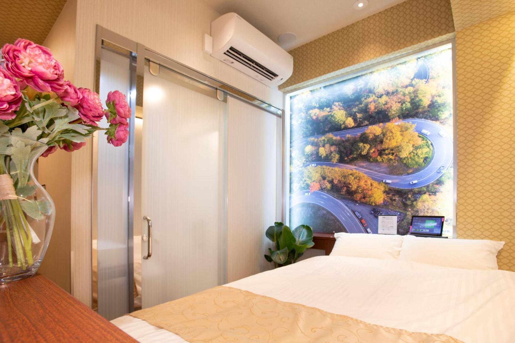 Hotel Xcell Hiroshima Nagarekawa Pokoj fotografie